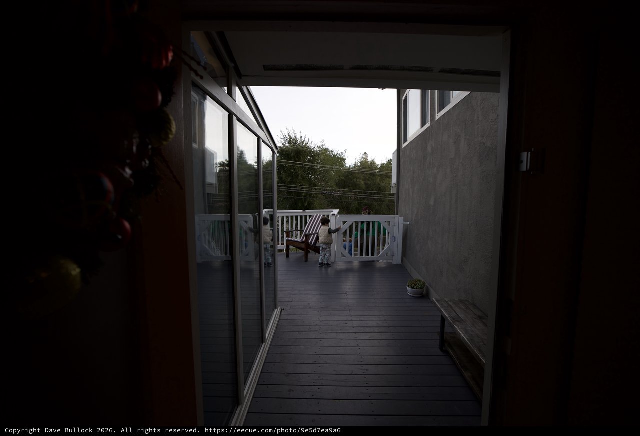 Evening View Through Open Door to Covered Deck