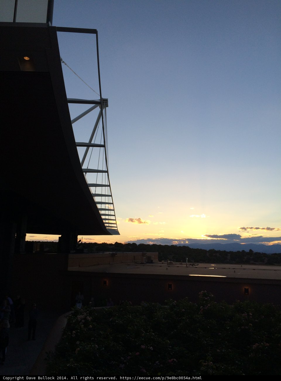 Serene Sunset View from Building with Bridge