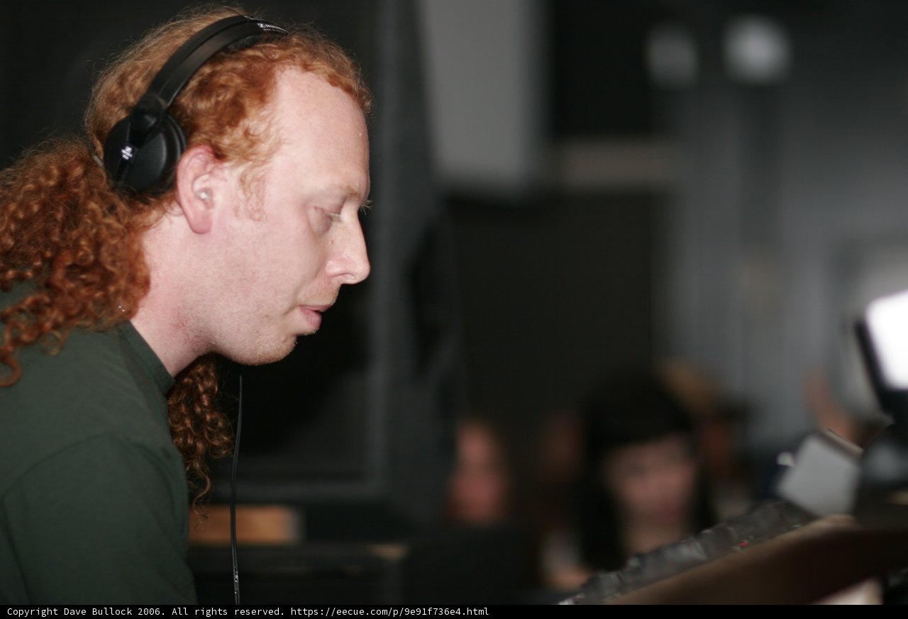 Tech-savvy redhead