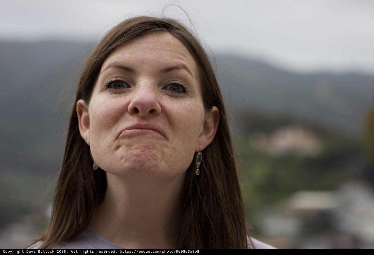 Woman Making a Pouty Face Outdoors in Mountains