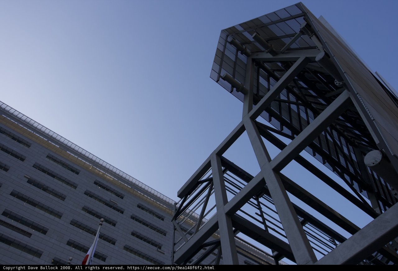 Metal Skyscraper Against Blue Sky