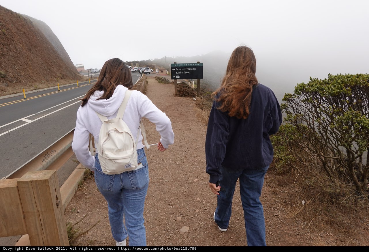 Two Friends Walking to Scenic Overlook