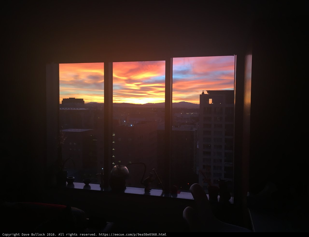 Serene Sunset View from an Urban Window
