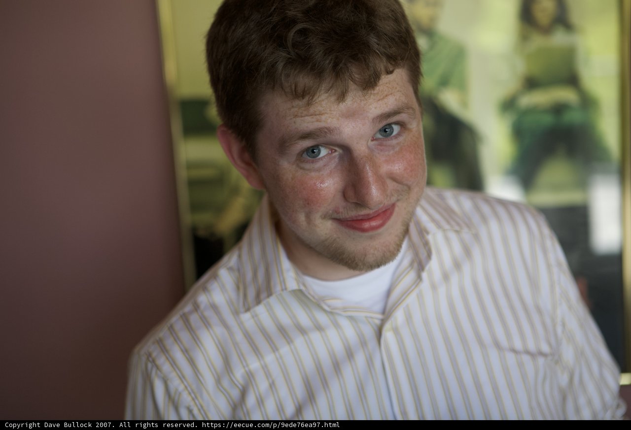 The Happy Man in the White Dress Shirt