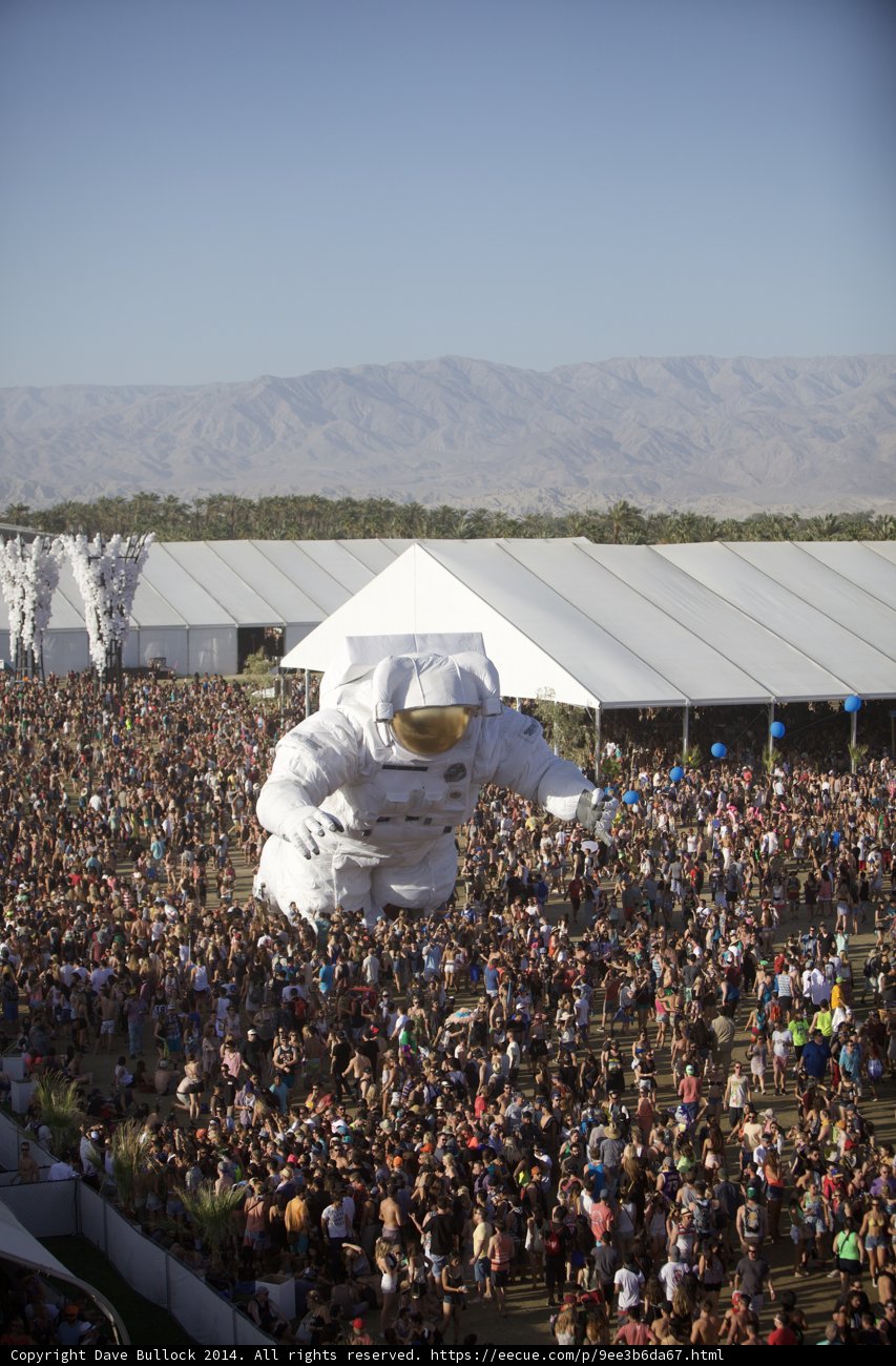 Festive Crowd Under a Giant Balloon