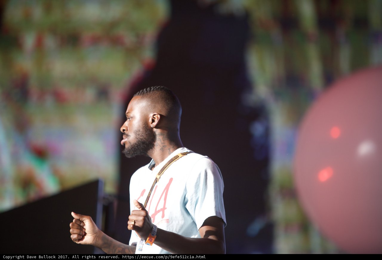 Bearded Man Takes the Stage with Microphone