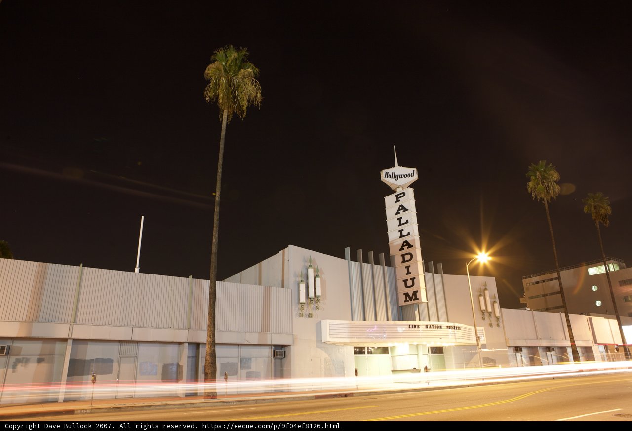Illuminated Landmark: Clock Tower and City Theater