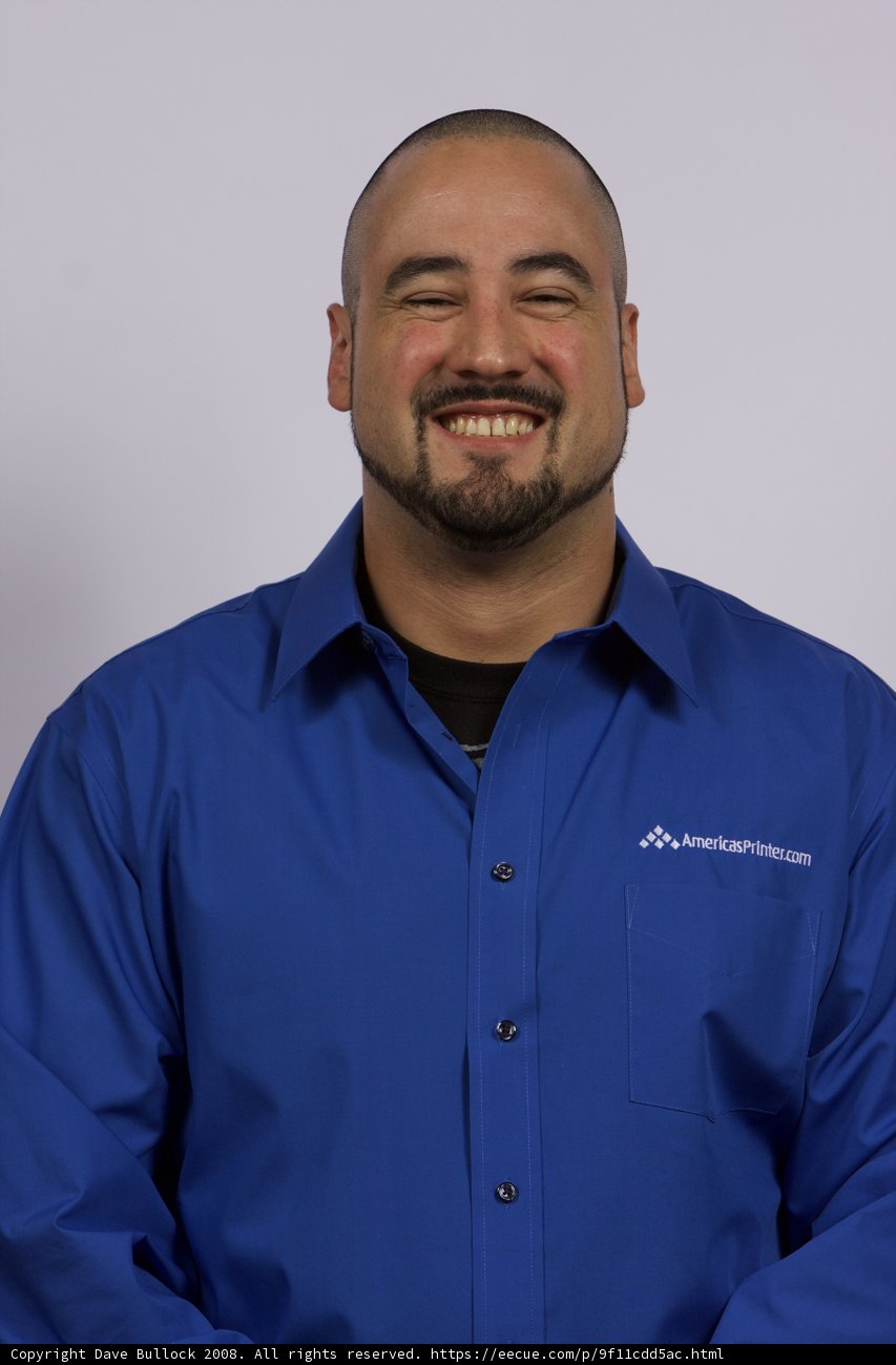Blue Shirt Man Strikes a Pose
