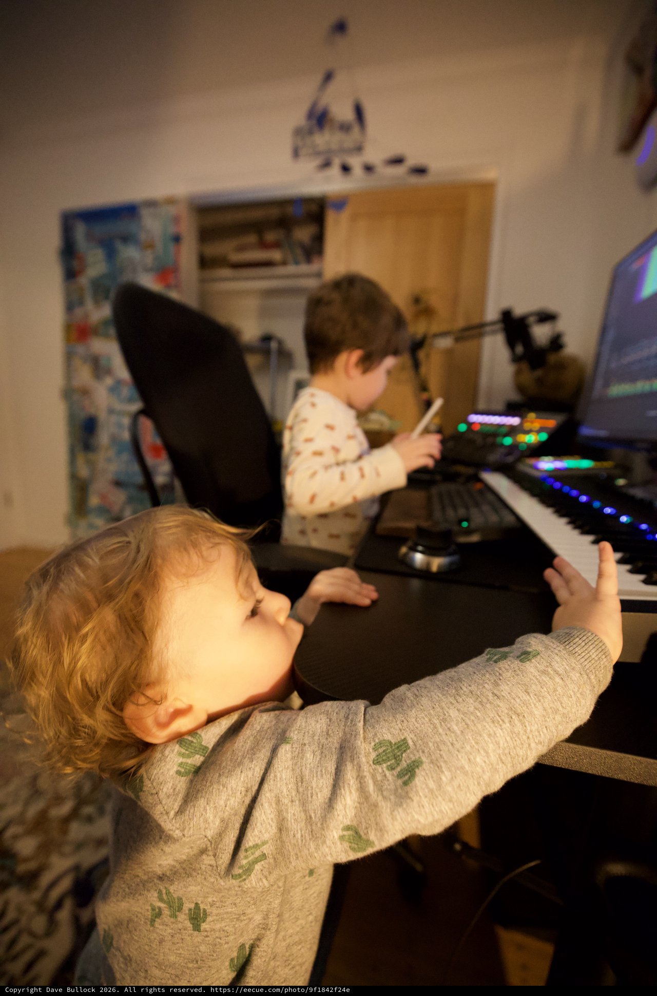 Young Brothers Making Music Together at Home