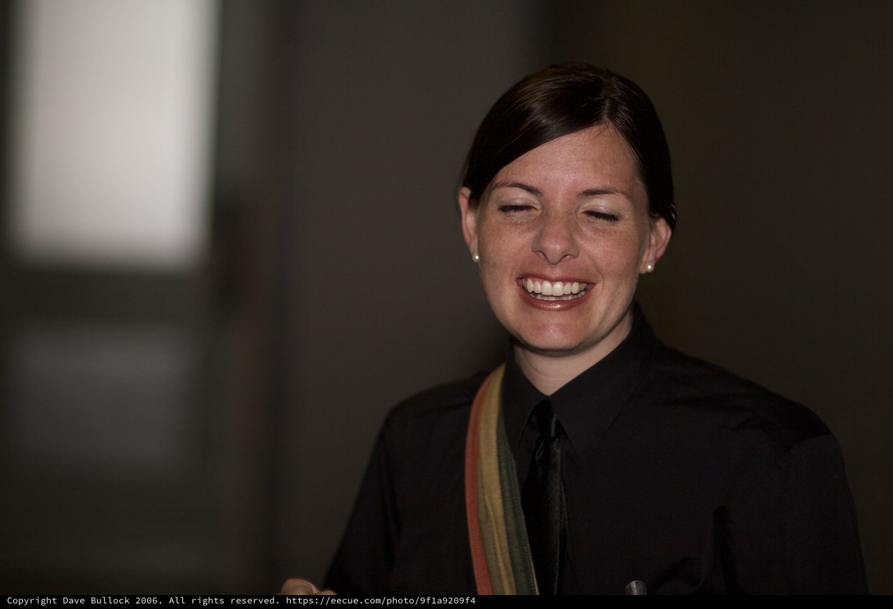Penelope's Warm Smile in Black Attire