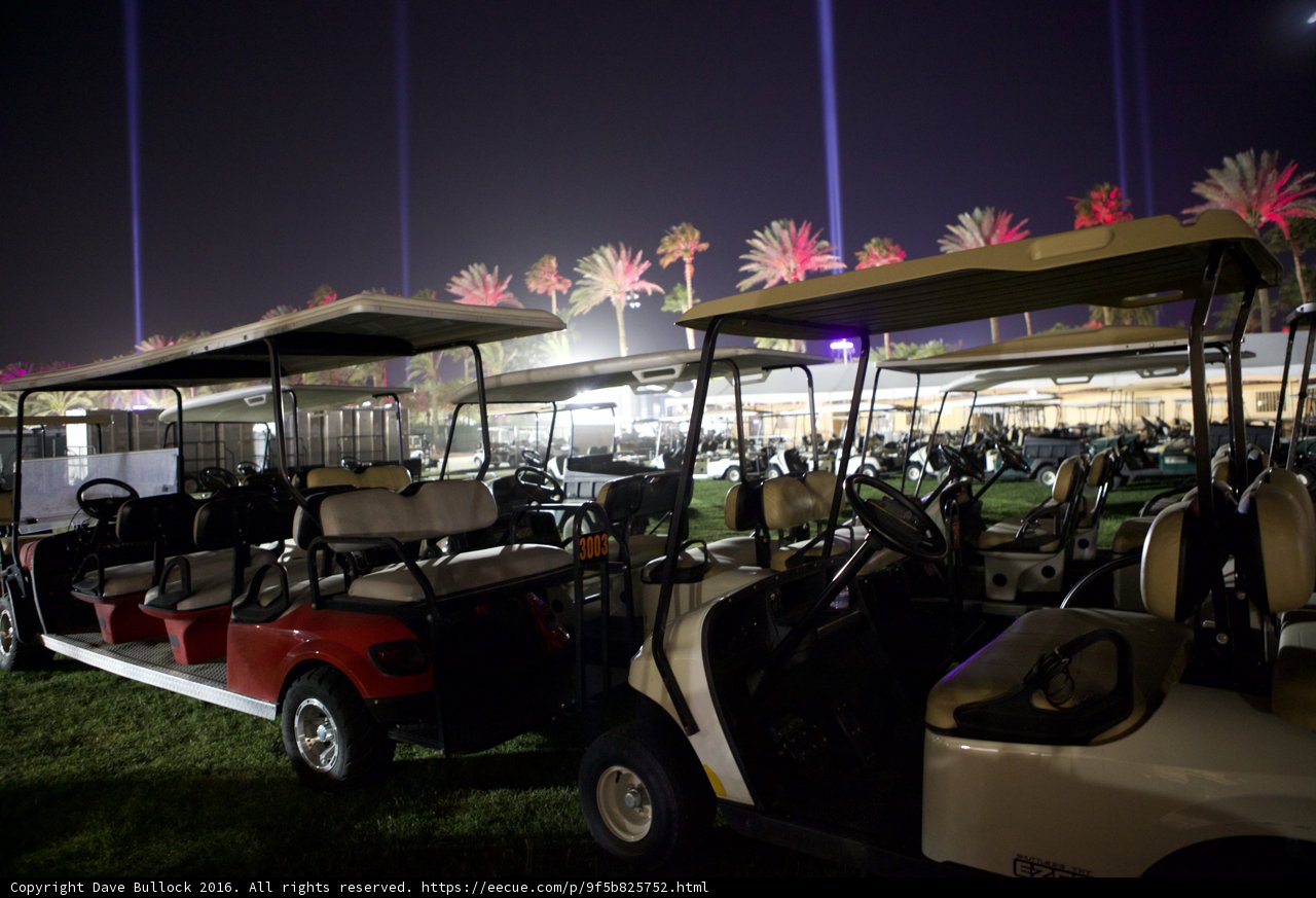 Nighttime Retreat: Golf Carts in the Field