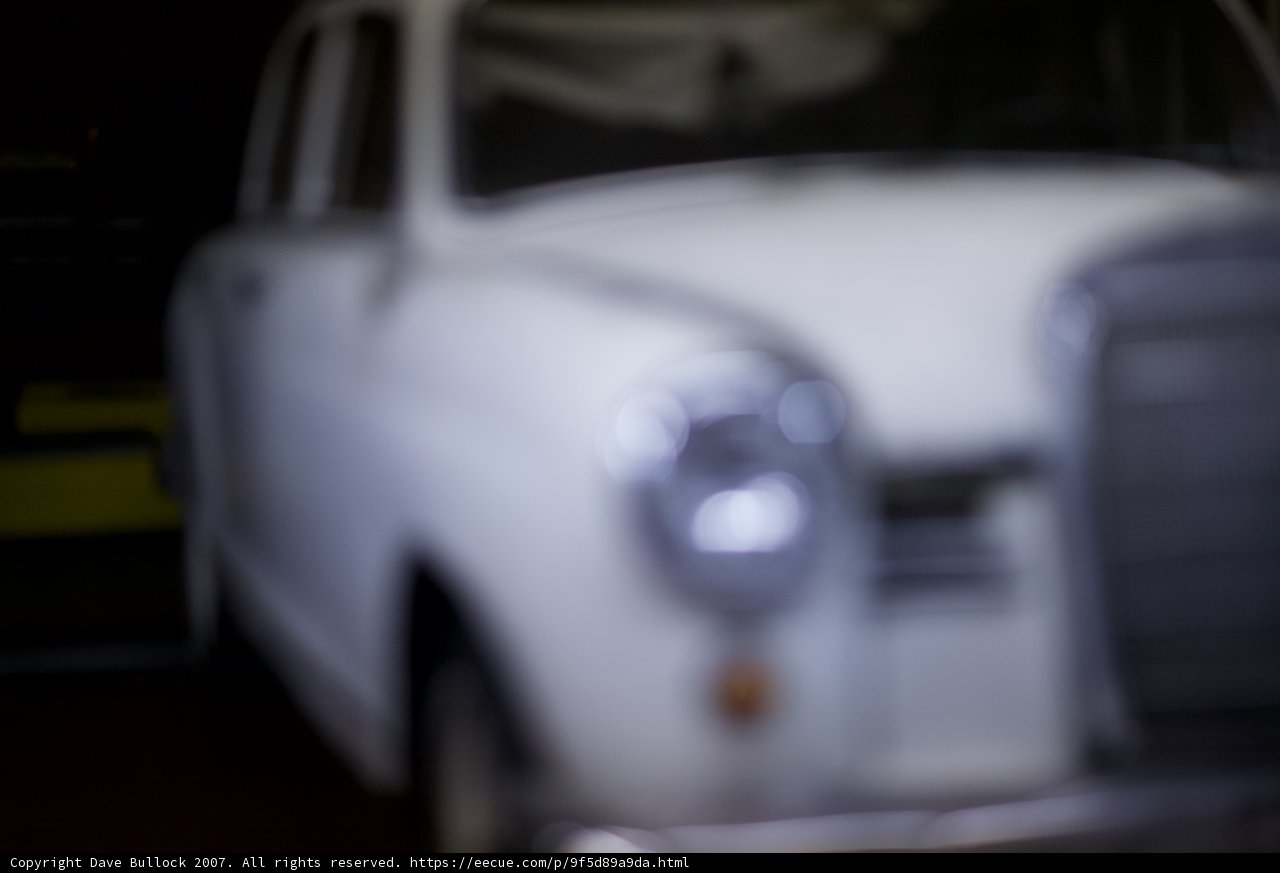 Glossy White Coupe in the Garage