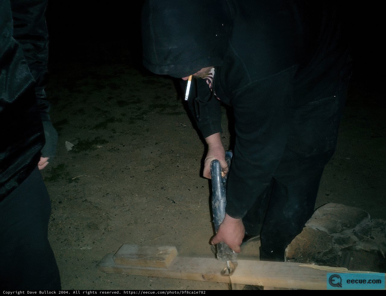 Hooded Carpenter at Work