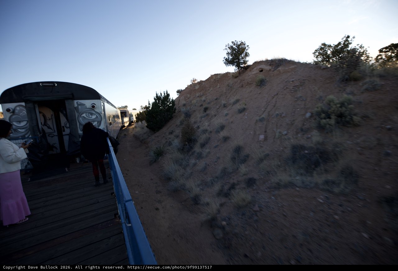 Twilight Train Journey Through Desert Hills