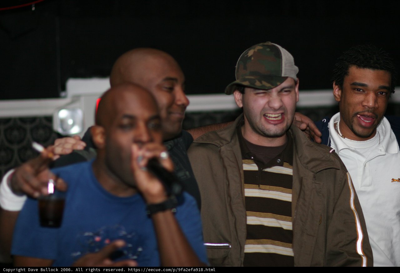 Group of Men Enjoying Night Out at Urban Club