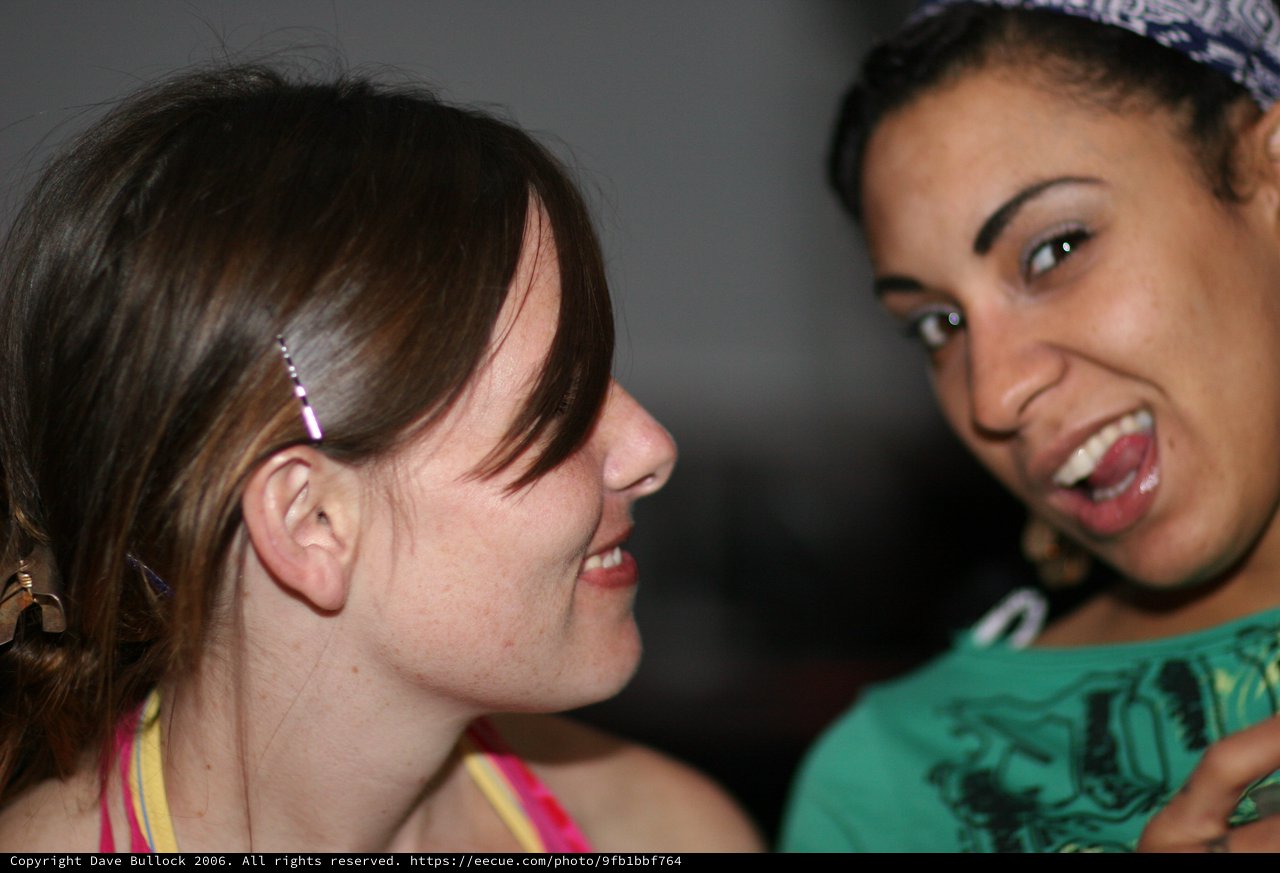 Two Friends Sharing a Joyful Moment Together