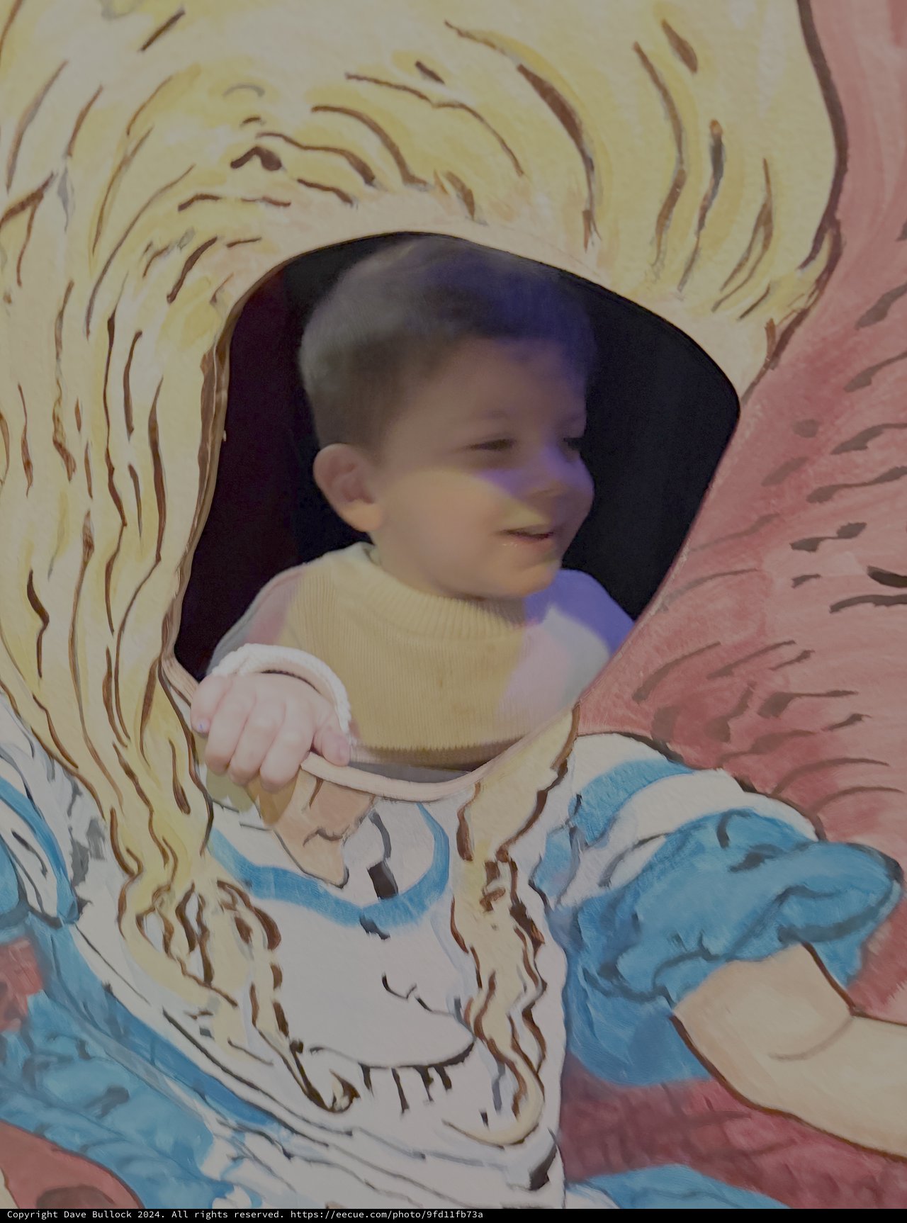 Baby Playing in Colorful Digital Art Display