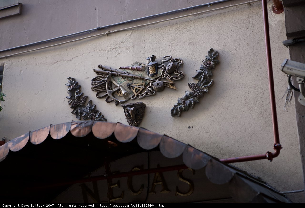 Emblematic Metal Sculpture on Building