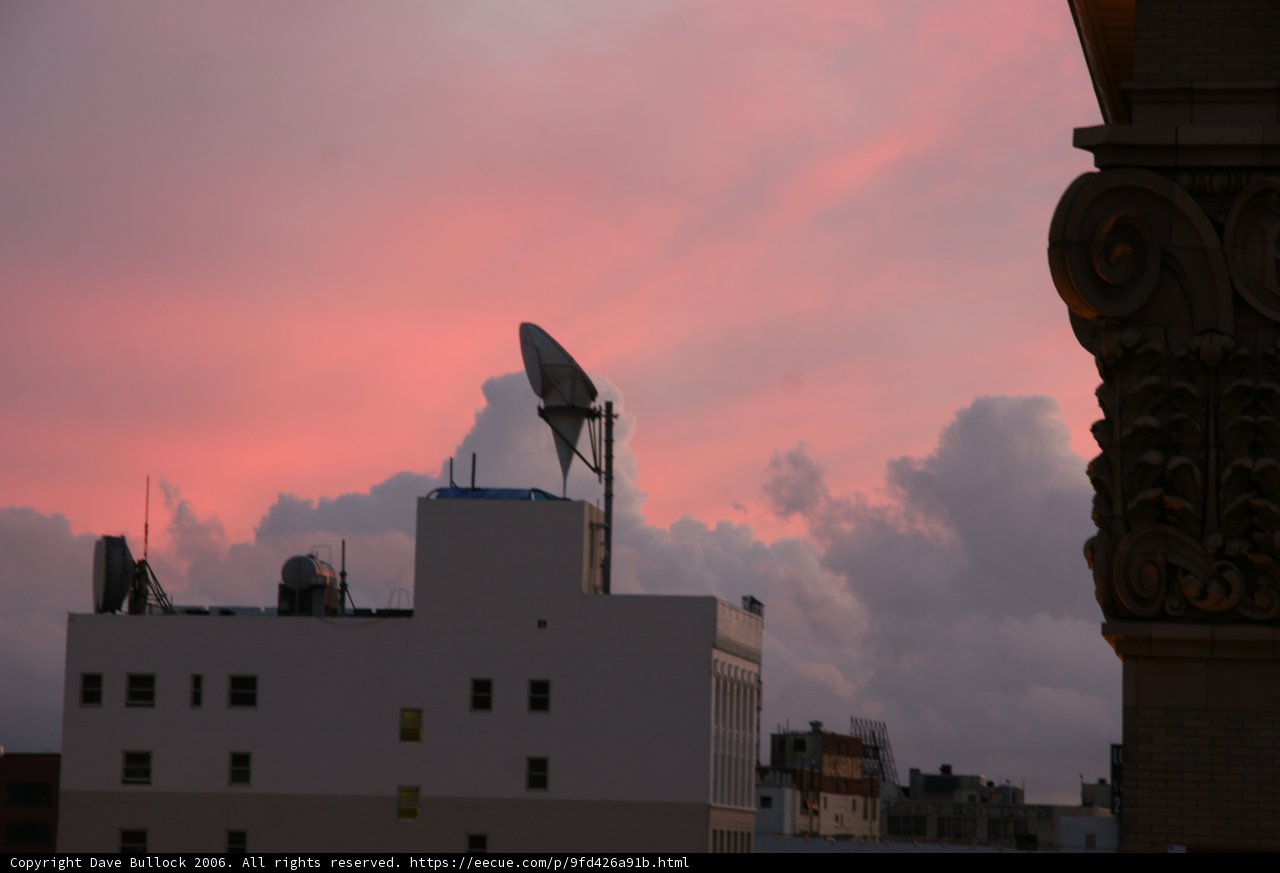 Pink Skies over City Architecture