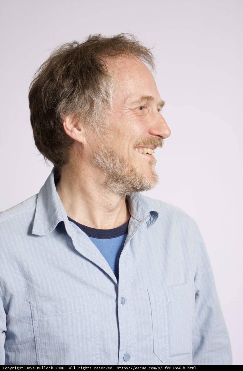 Happy Tim O'Reilly in Blue Shirt and Beard