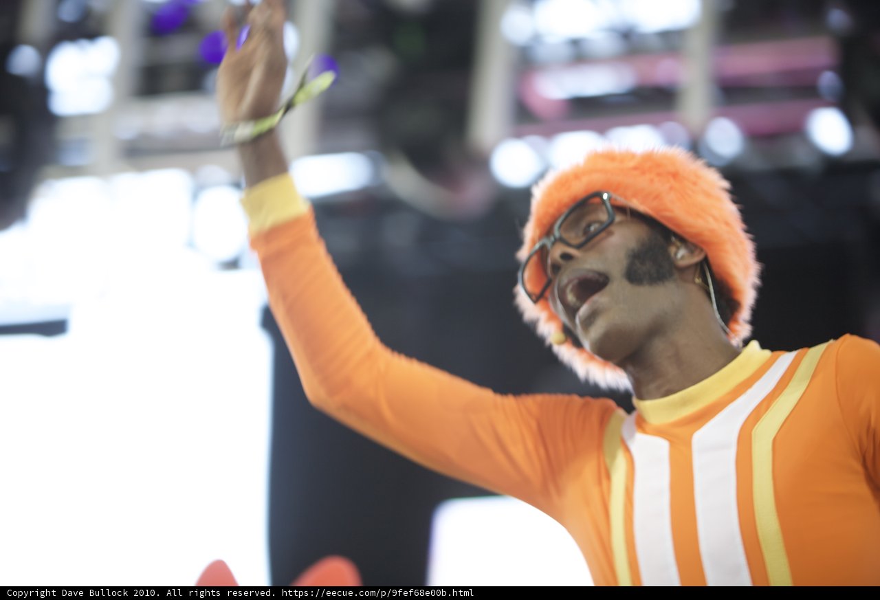 The Orange Outfit and Big Hat