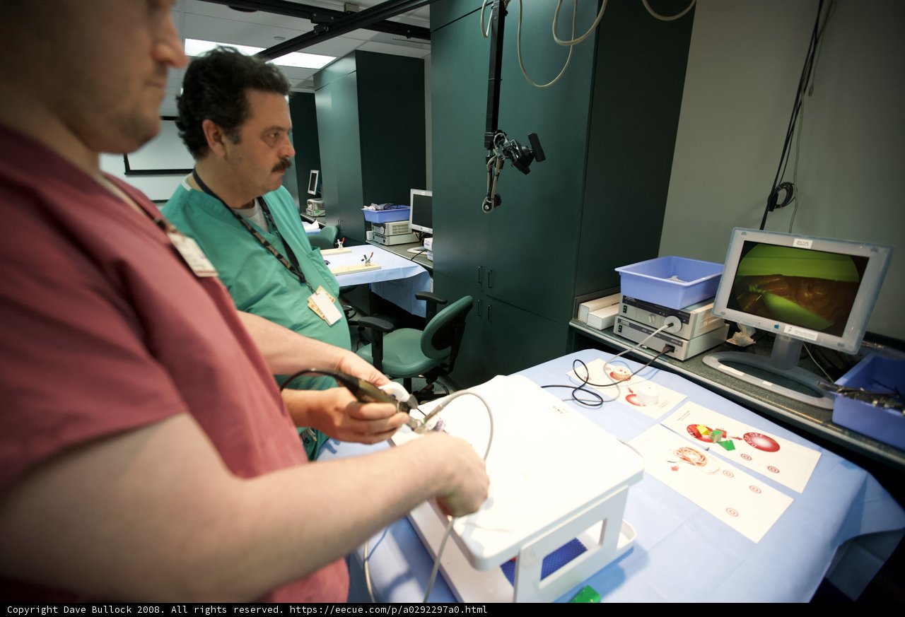 Two Men in a High-Tech Hospital Room
