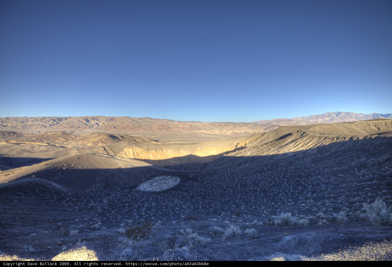 Desert Plateau with Distant Mountains