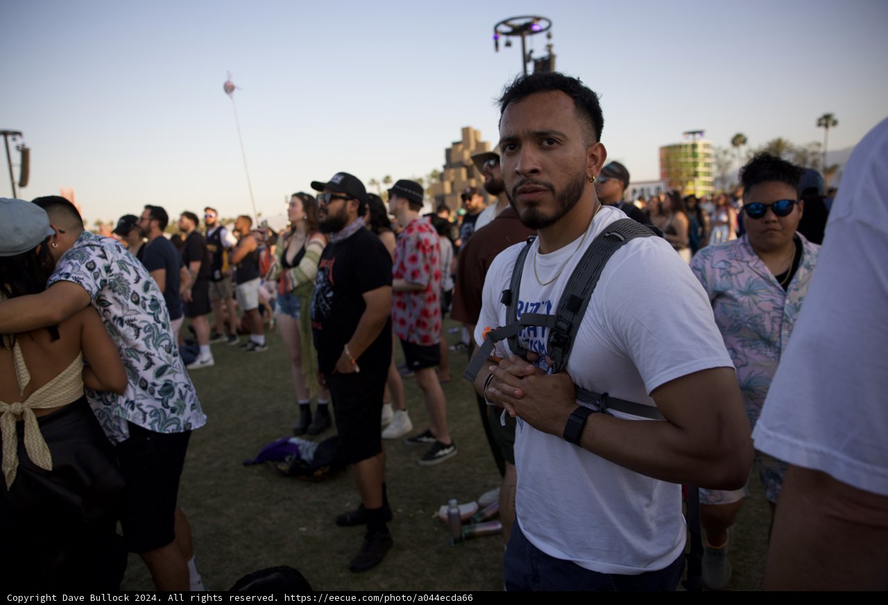 Amidst the Crowd: A Moment of Reflection at Coachella 2024