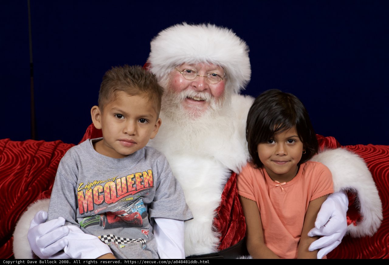 Santa Claus Bringing Joy to Children at APC Xmas Party