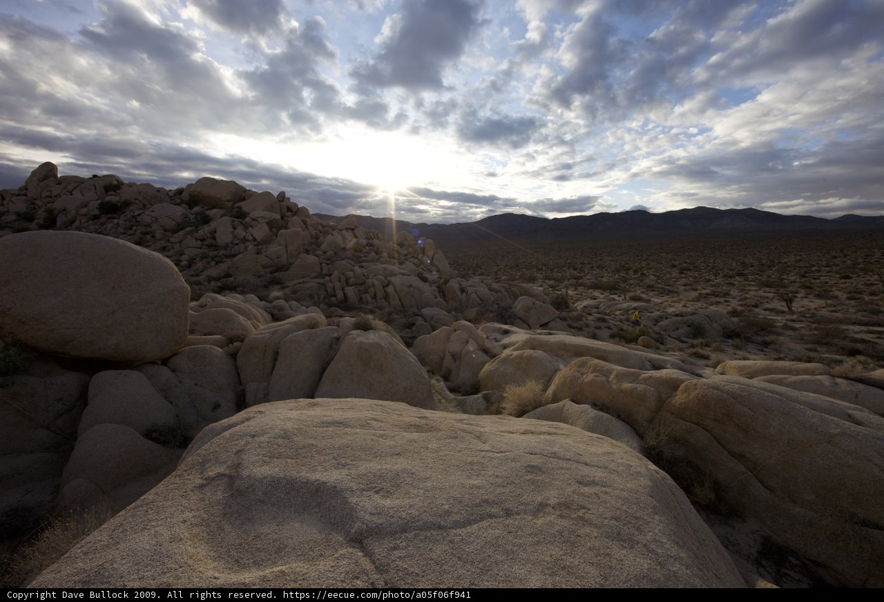 Rocky Landscape Shines under Sunlight Flares
