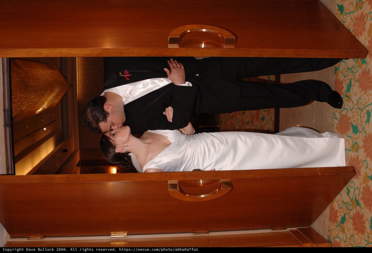 Newlyweds Share First Kiss at Reception Doorway