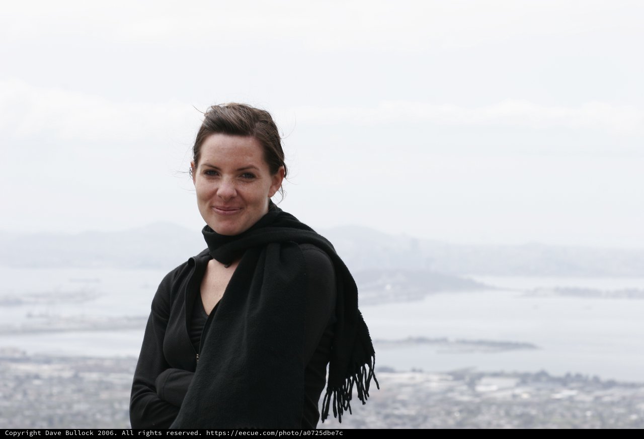 Woman Smiling Overlooking San Francisco Bay