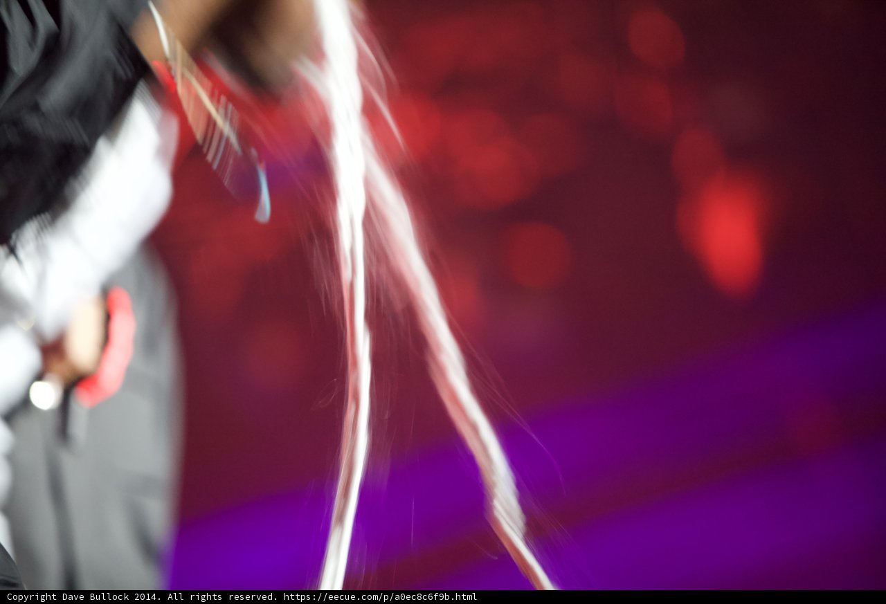 Blurry Woman Under Purple Lights
