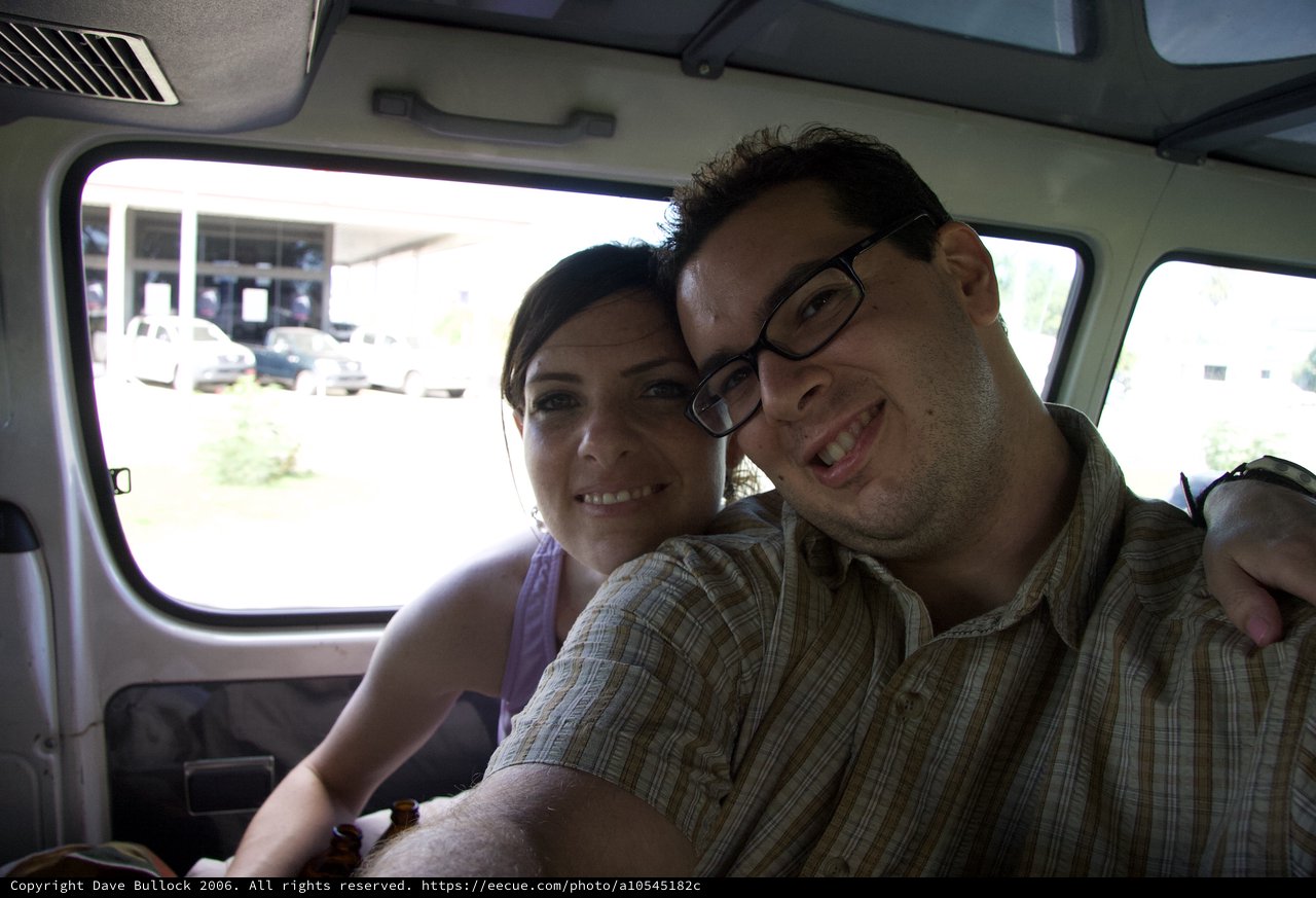 Couple Smiling Together Inside a Van in Fiji