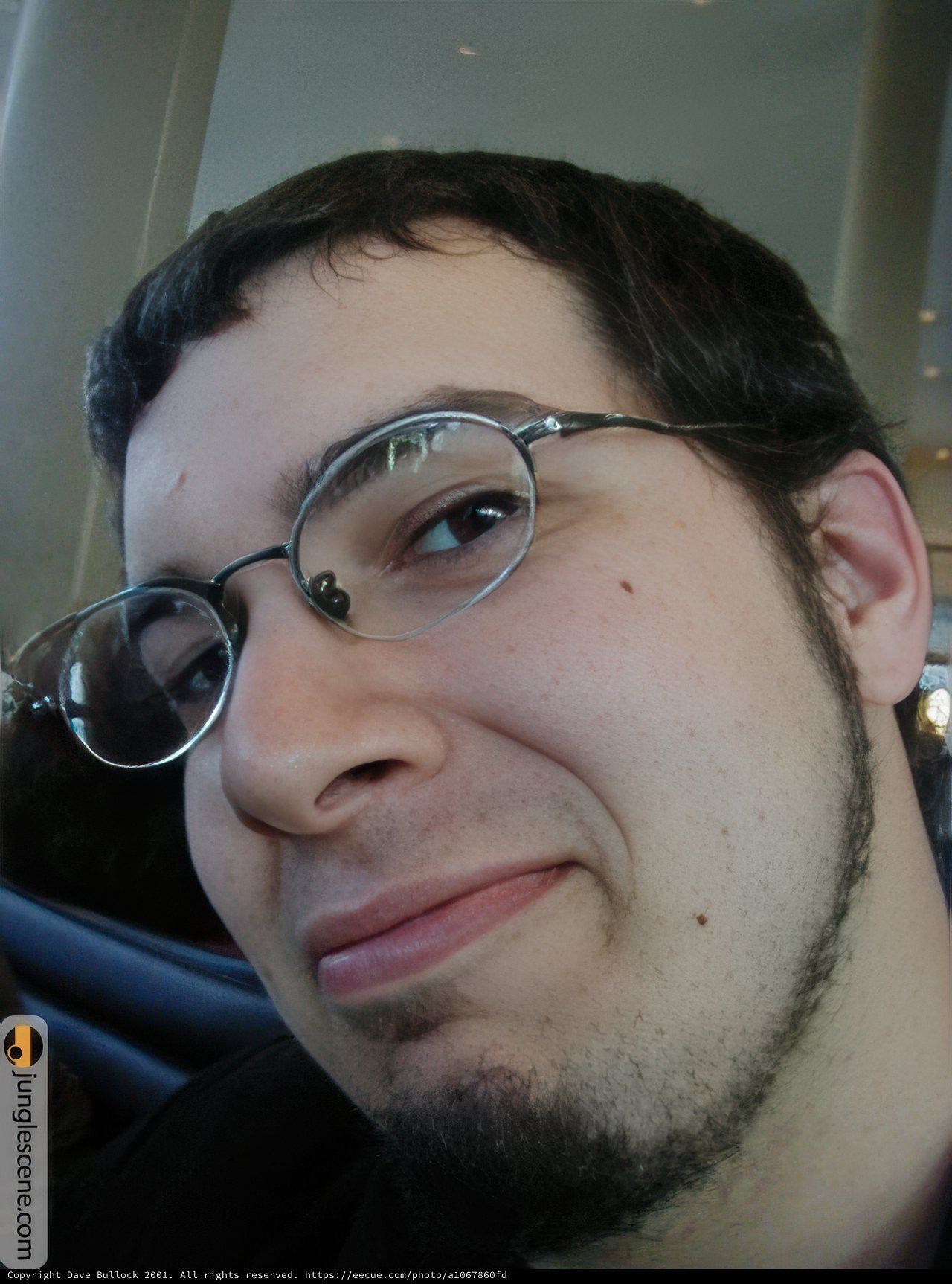 Portrait of a Happy Man with Glasses