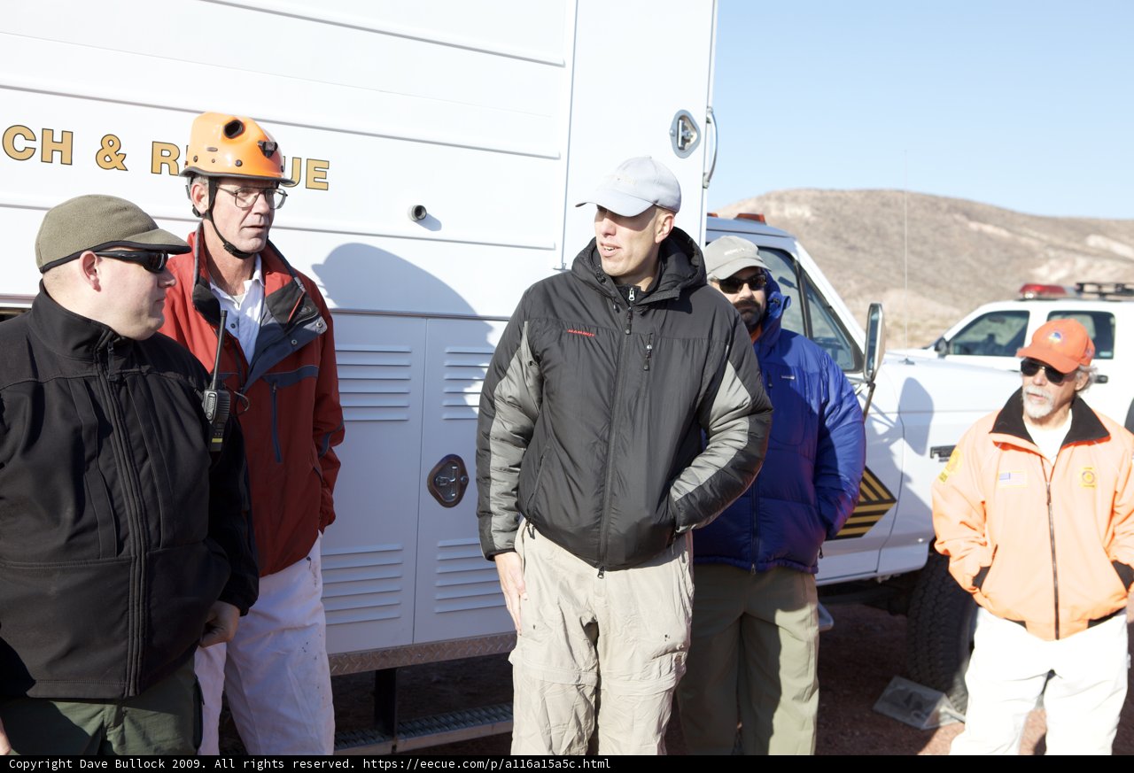 Mine Rescue Team Poses for a Photo in Front of Their Truck