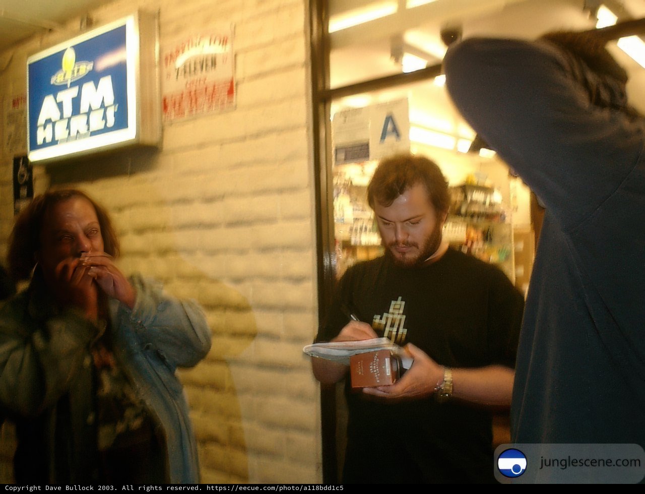 Jack Black on the Phone Outside a Store