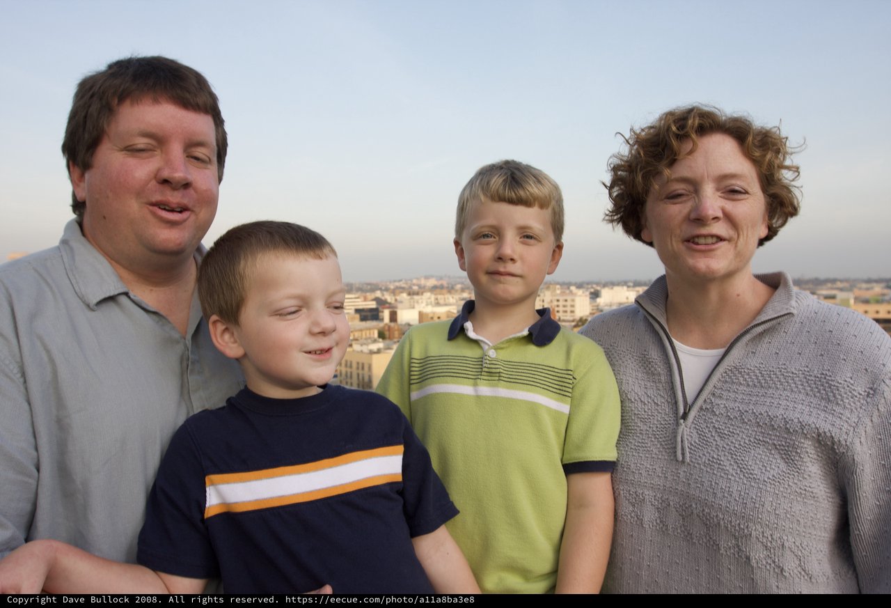 Family Portrait on Rooftop at Dusk