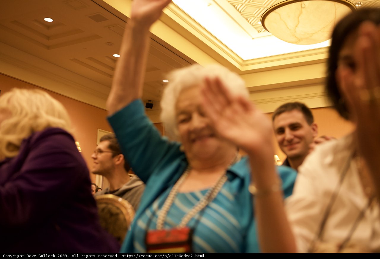 Applauding Conference Attendee