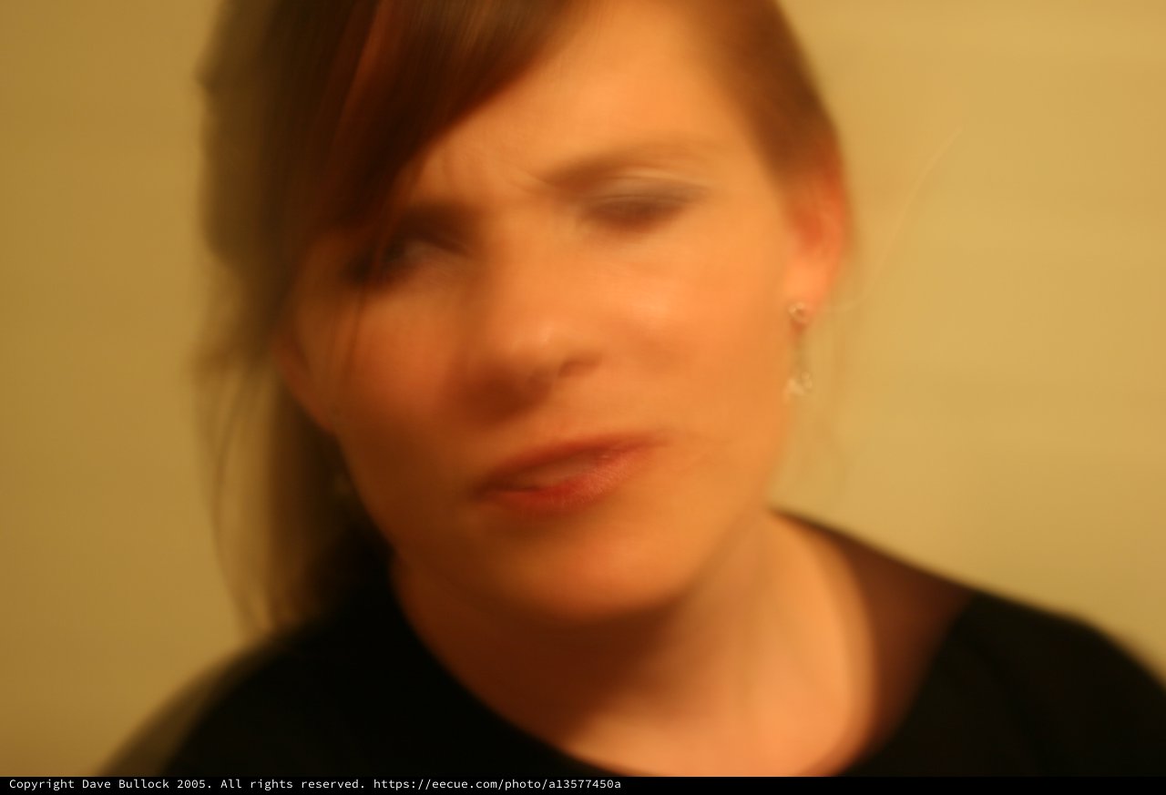 Motion Blur Portrait of Woman in Warm Light