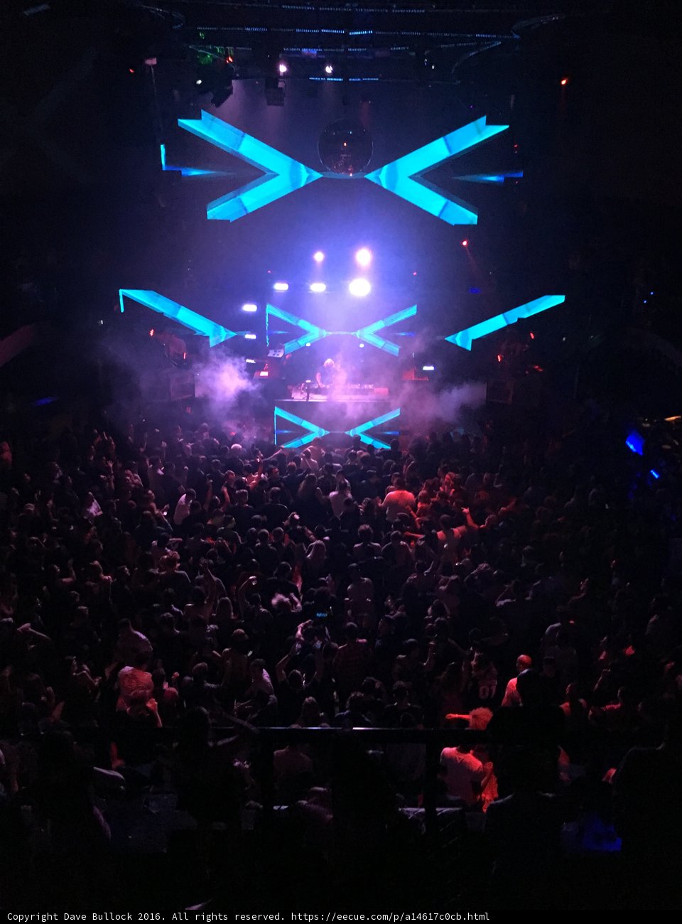 Blue Spotlight on the Urban Crowd