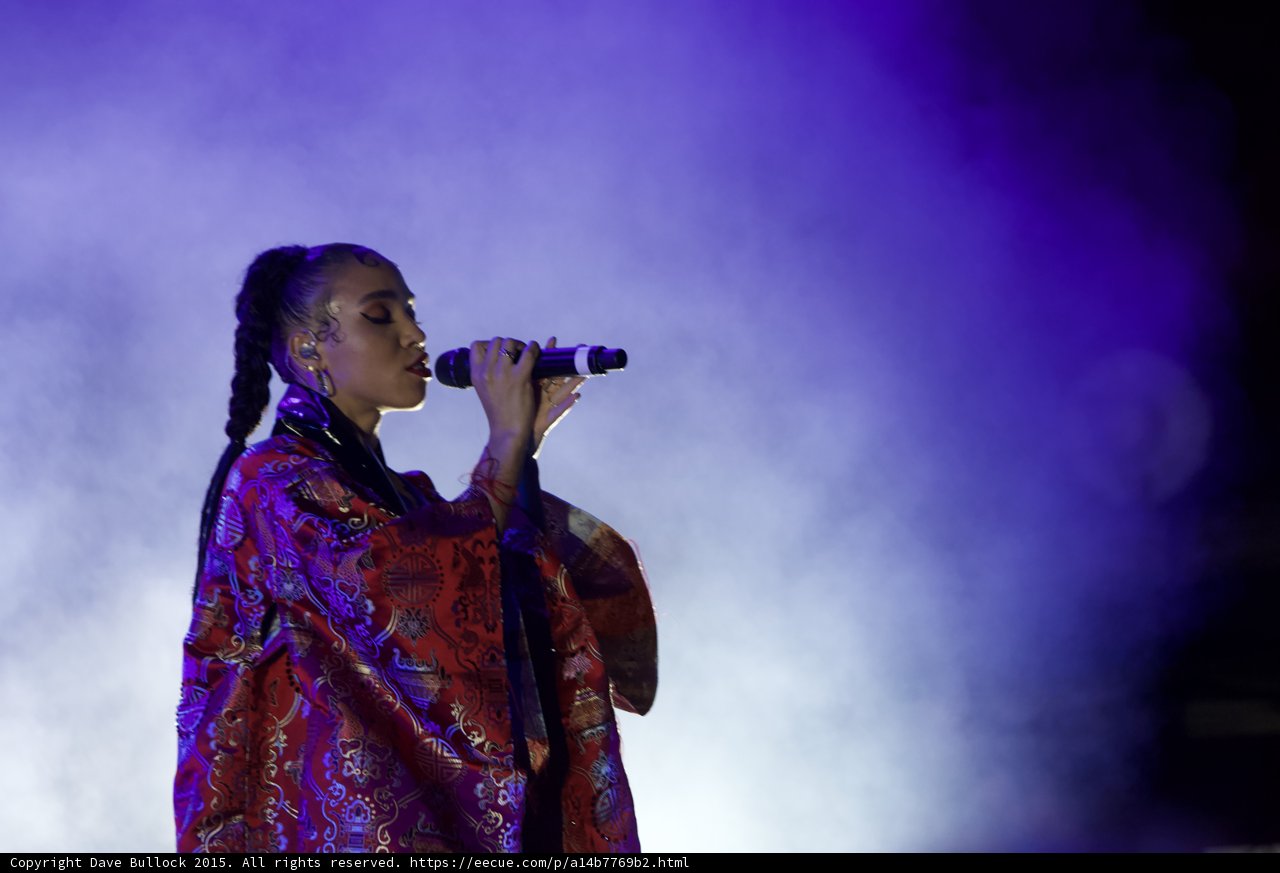 FKA twigs Beautiful Upper Body Profile Singing Eyes Closed Emotional Baby Hairs Swirls Hoop Earrings Red Lipstick Braided Ponytail Black Choker Rings Kimono Red Brocade Gold Patterns Purple Blue Lighting Heavy White Haze