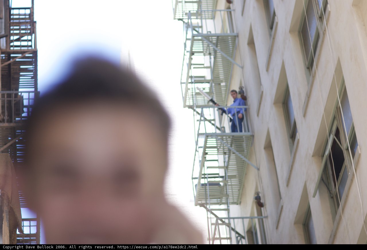 Blurry Man on Fire Escape