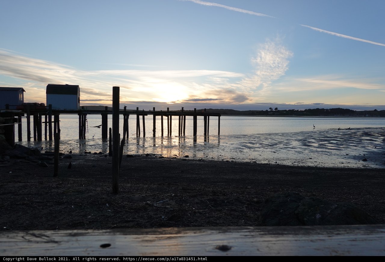 Serene Waterfront Pier at Sunset