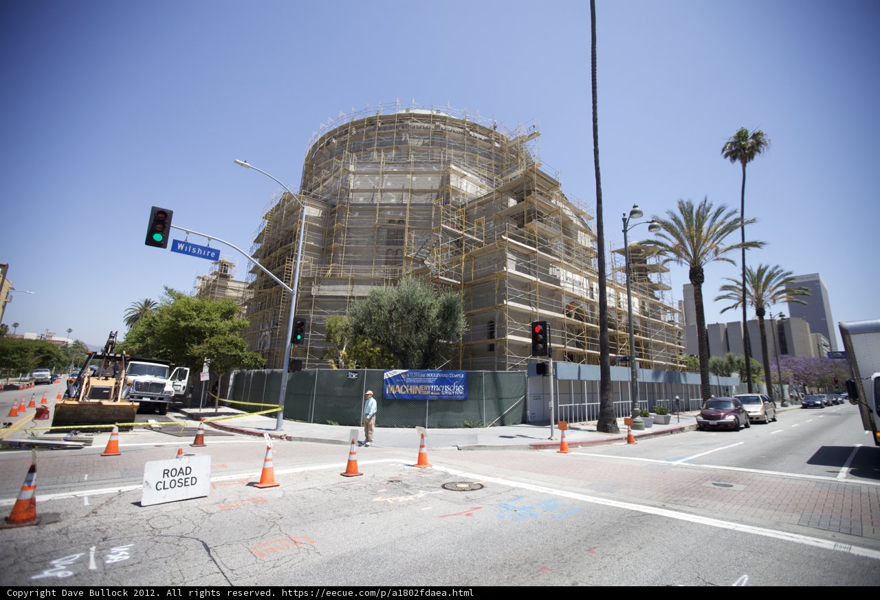 Towering Construction at Busy Intersection