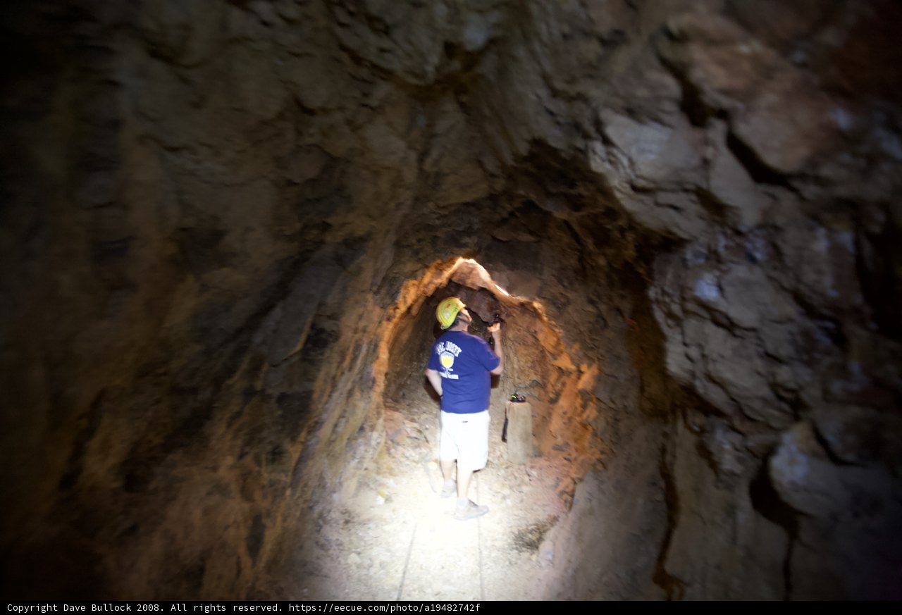 Cave exploration with a flashlight