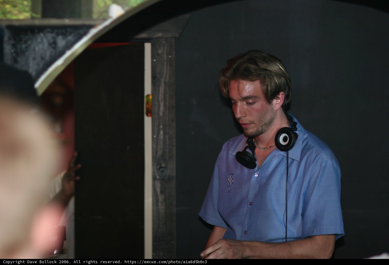 Blue Shirted Man with Electric Mic