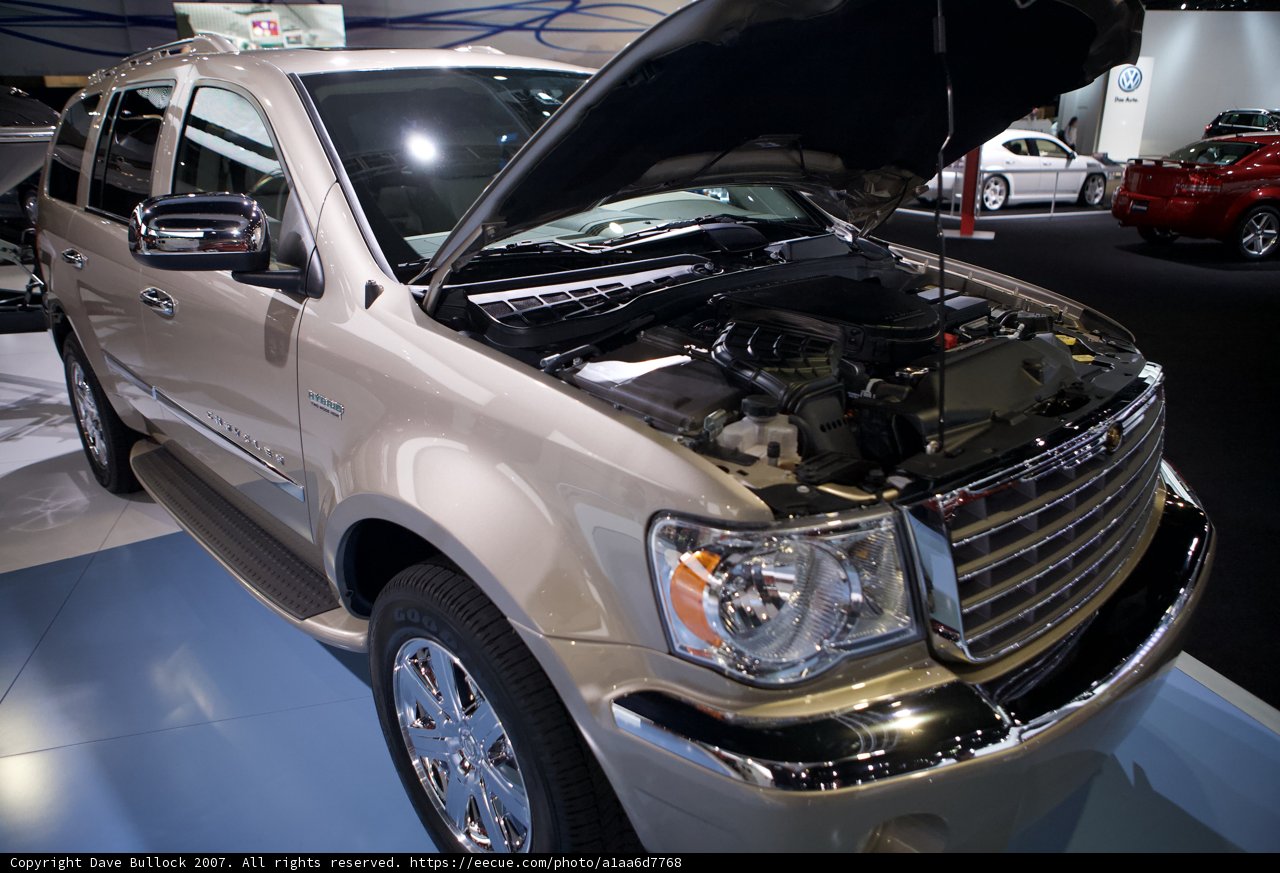 Showcasing the Beige SUV's Powerful Engine