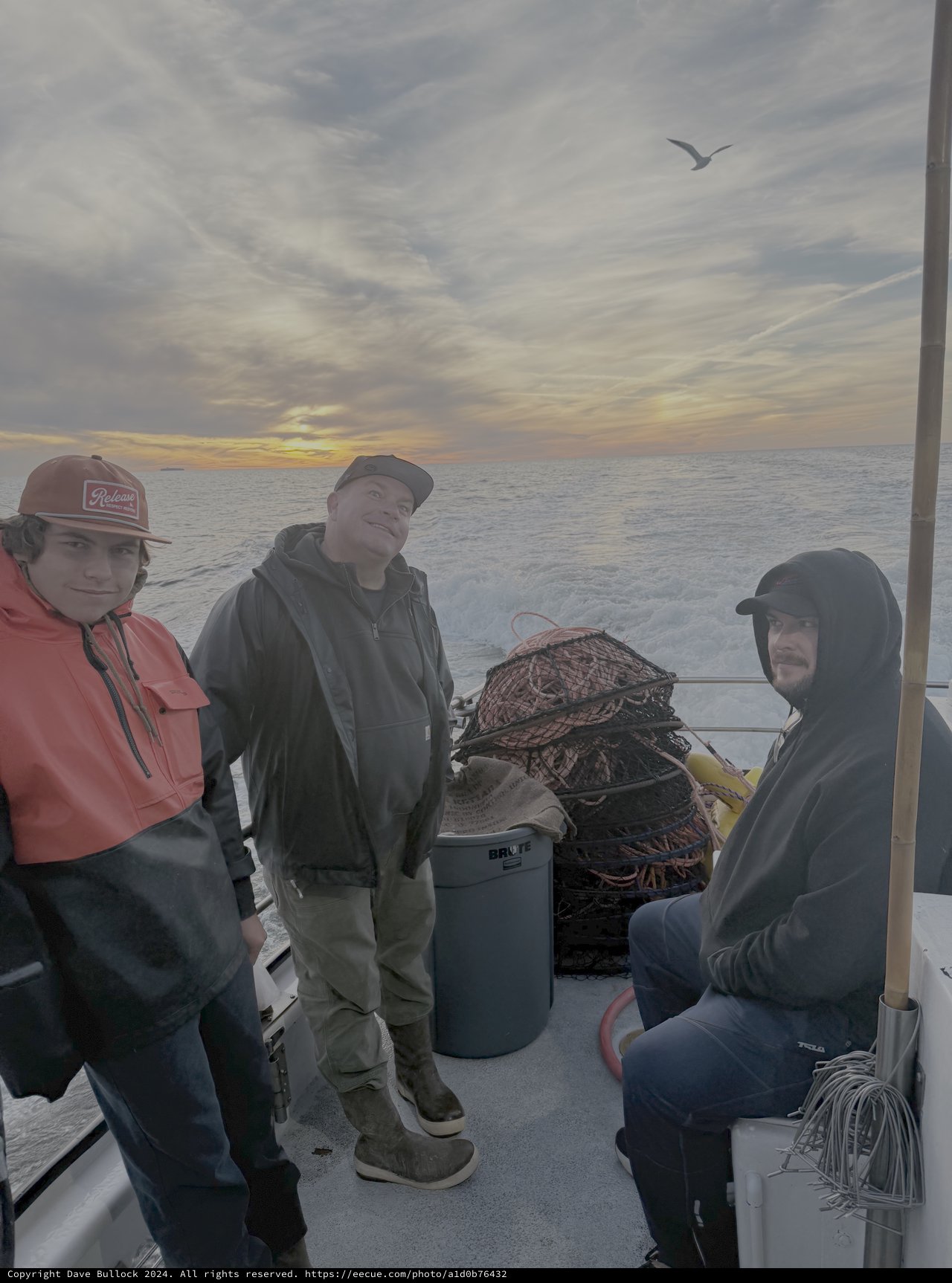 Commercial Fishermen on Boat at Sunrise