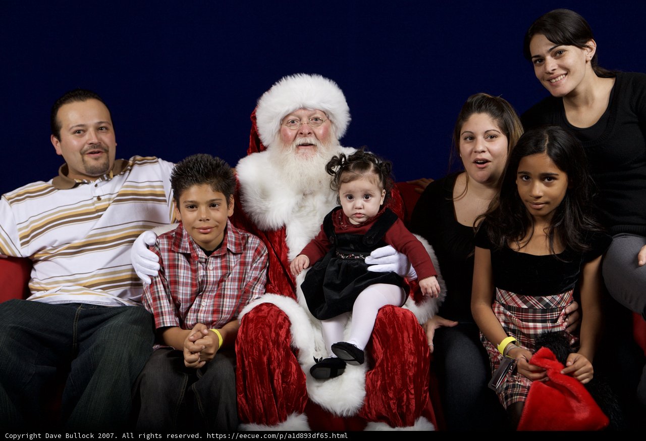 A Festive Family Portrait with Santa Claus